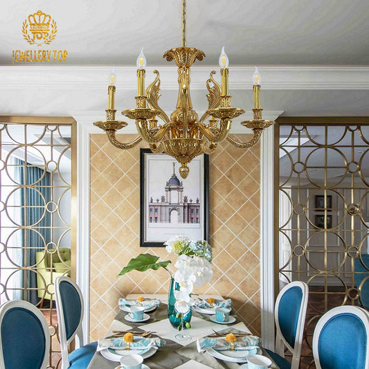 A classical brass chandelier installed in an elegant room with ornate ceiling molding and a grand piano.