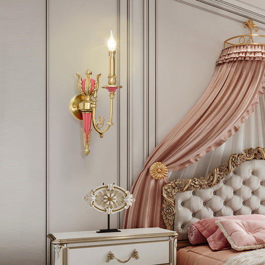 The installed French design wall lamp in an elegant bedroom with a canopy bed and pink drapery.