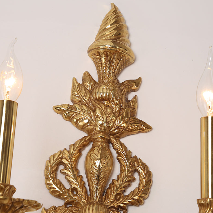 Detailed view of the fabric lampshade wall light with beaded trim and hanging crystal droplet embellishments.