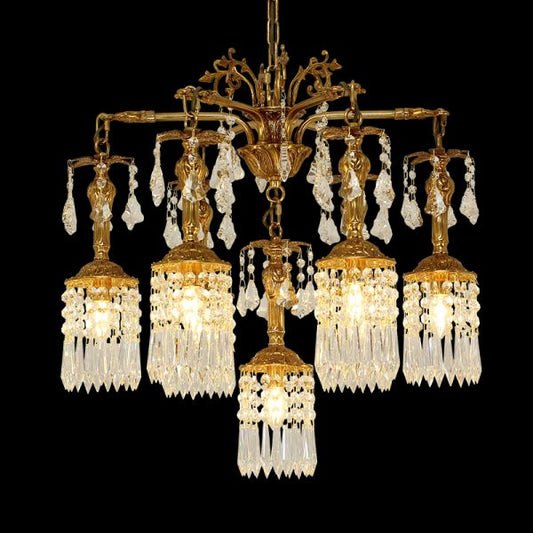 A european luxury chandelier installed in a grand foyer with intricate ceiling moldings and a sweeping staircase.