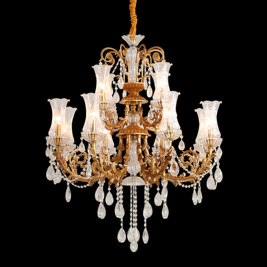A crystal decorative chandelier illuminating a spacious, elegantly furnished home living room.
