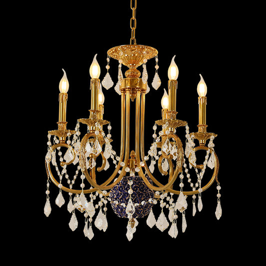 A french chandelier installed in a luxurious boutique hotel lobby with ornate wall sconces and a grand mirror.