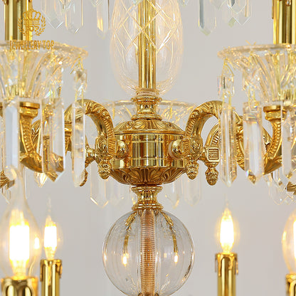 Extreme detail shot focusing on the candle-shaped filament bulbs and the decorative brass canopy at the top.