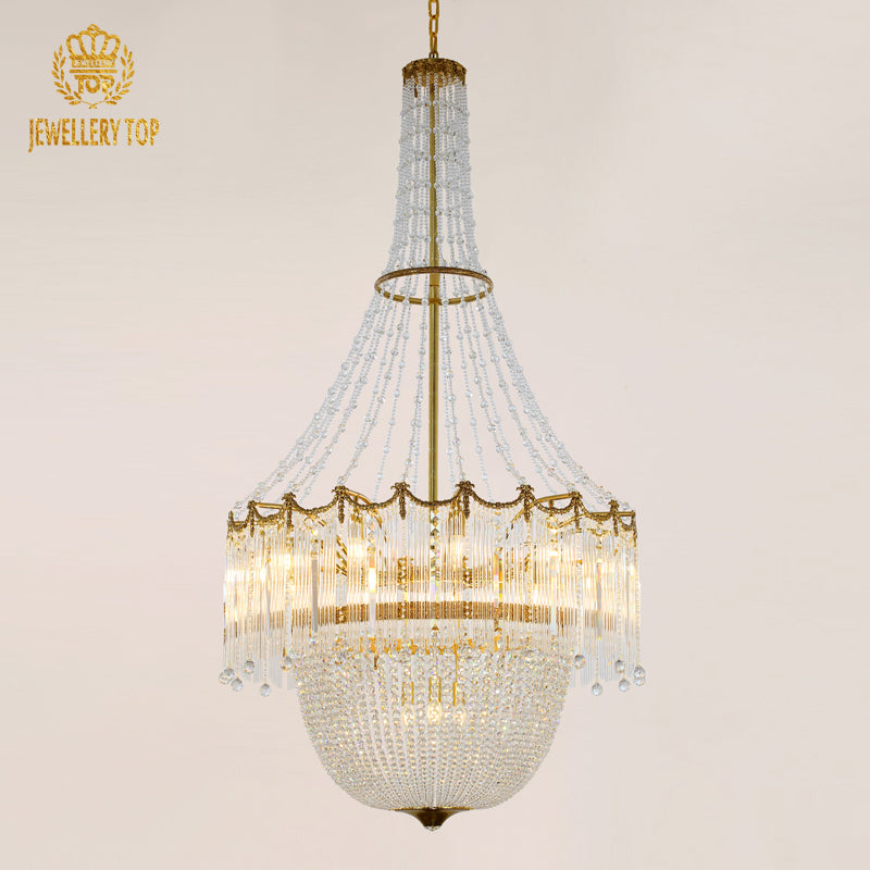 JEWELLERY TOP brand's hotel lobby chandelier showcasing cascading crystal strands and a domed silhouette.