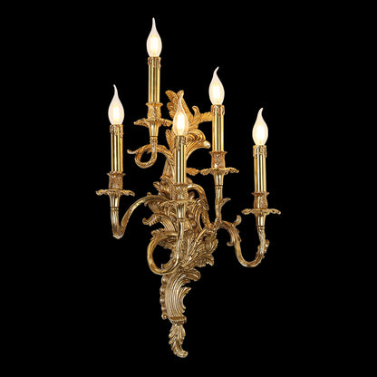 Front view of the five-arm Victorian Gala golden brass candelabra wall sconce with lit candle bulbs on black.