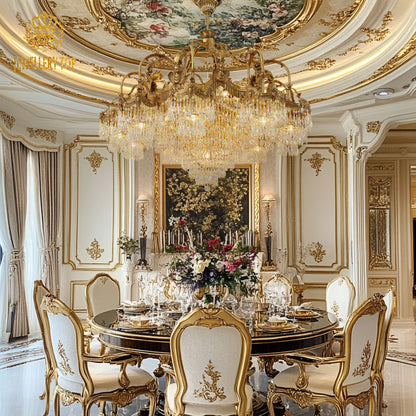 JEWELLERY TOP's brass chandelier above a formal dining set with flowers and white chairs.