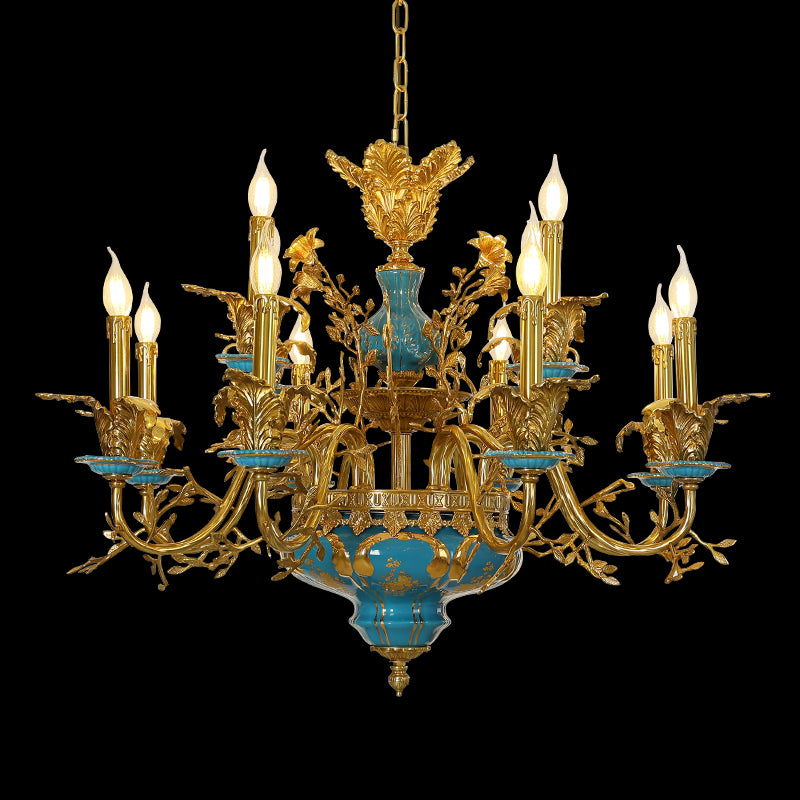 Full studio shot of the French Rococo turquoise porcelain floral brass chandelier glowing against a stark black background.