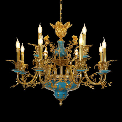 Full studio shot of the French Rococo turquoise porcelain floral brass chandelier glowing against a stark black background.