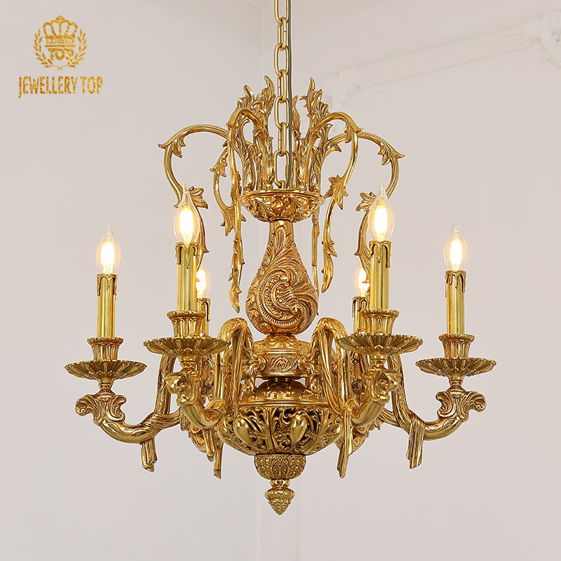 JEWELLERY TOP brand's luxury decorative chandelier showcasing intricate golden scrollwork and cascading crystal accents.