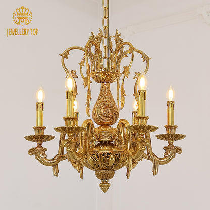 JEWELLERY TOP brand's luxury decorative chandelier showcasing intricate golden scrollwork and cascading crystal accents.