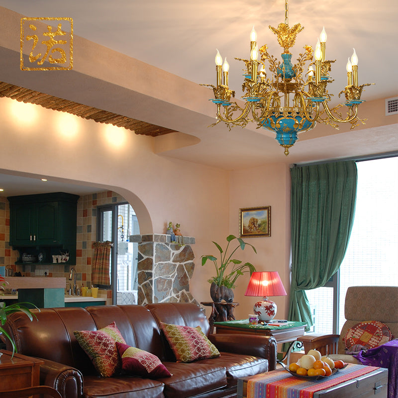 Angled perspective showcasing the multi-tiered candle-style lights and the elaborate scrolling brass arms.