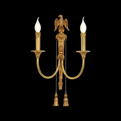 Detailed product shot of the French hotel decor wall lamp, showcasing the eagle, lit candle bulbs, and ornate chains.