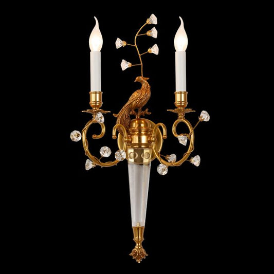 Front view of the L’Oiseau de Versailles brass bird wall sconce with fabric shades and crystal leaves on a black background.
