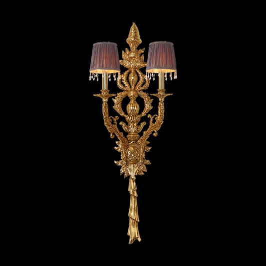 Front view of the Baroque Soleil golden brass wall sconce with two fabric shades and crystal fringes on black.
