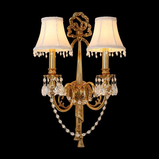 Close-up front view of the Noeud de Dentelle brass wall sconce with lace-trimmed shades on a black background, JEWELLERY TOP.