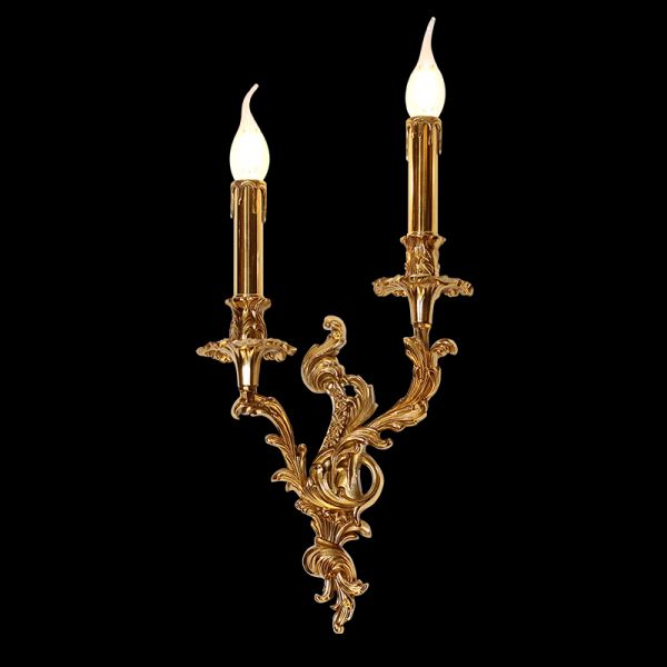 Side profile of the two-arm antique bronze wall lamp, showcasing its elegant curves and detailed metalwork.