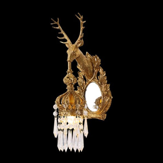 JEWELLERY TOP Royal Stag Brass Wall Sconce with crystal drops and oval mirror, detailed close-up on black.