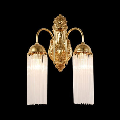 Cascade de Cristal Brass Wall Sconce with crystal droplets and glass shades on a dark background.