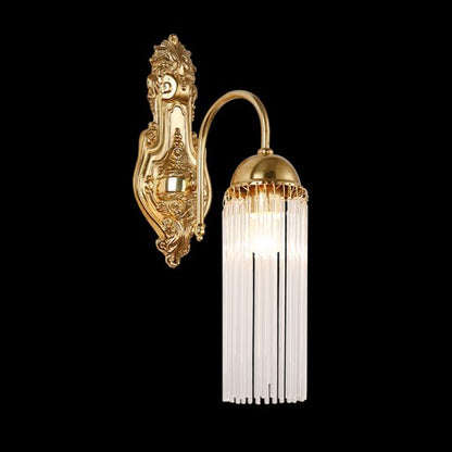 Front view of the decorative wall lamp with its glowing glass cylinders and crystal fringe.