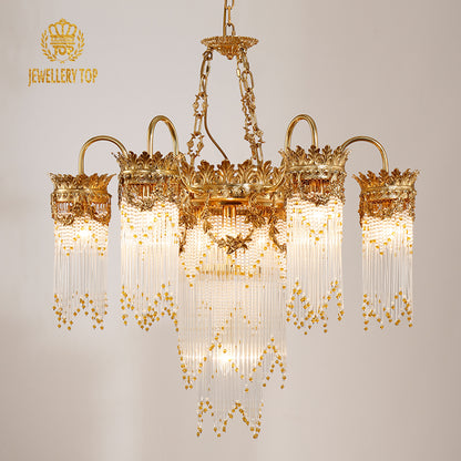 JEWELLERY TOP brand's hotel chandelier with intricate crest carvings and cascading crystals.