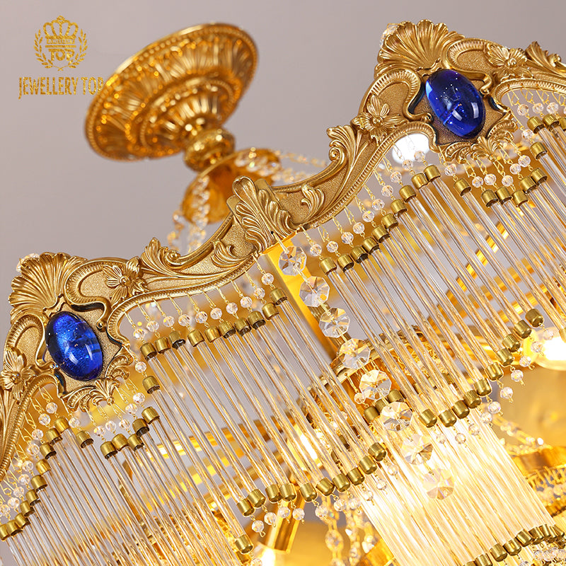 Extreme detail shot focusing on the sparkling teardrop and faceted K9 crystal pendants hanging from the lower tier.