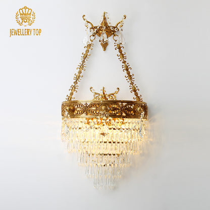 Detailed product shot of the luxury crystal lampshade wall sconce, showcasing its elegant form and sparkling details.