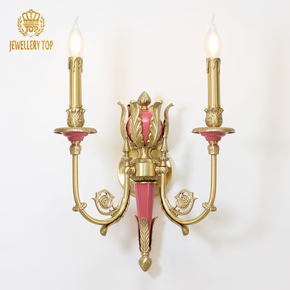 JEWELLERY TOP Fleur de Sève brass wall sconce with pink flower and teal leaves on a white background.
