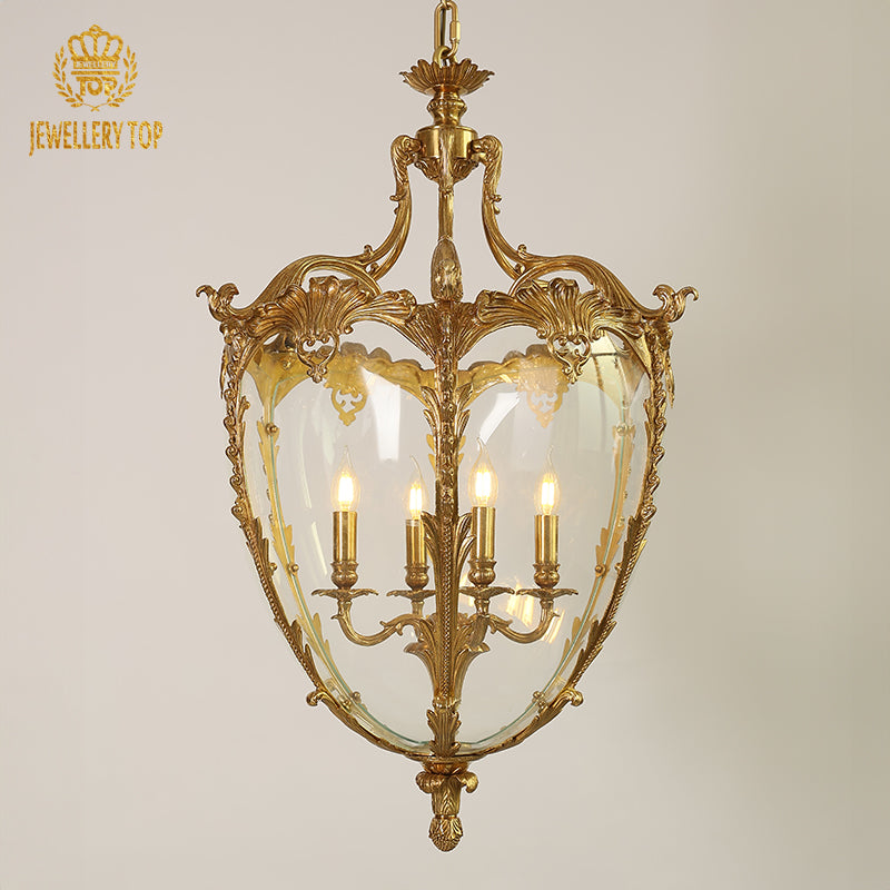 JEWELLERY TOP French brass pendant light with ornate carvings and four candle bulbs.