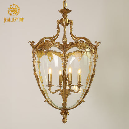 JEWELLERY TOP French brass pendant light with ornate carvings and four candle bulbs.