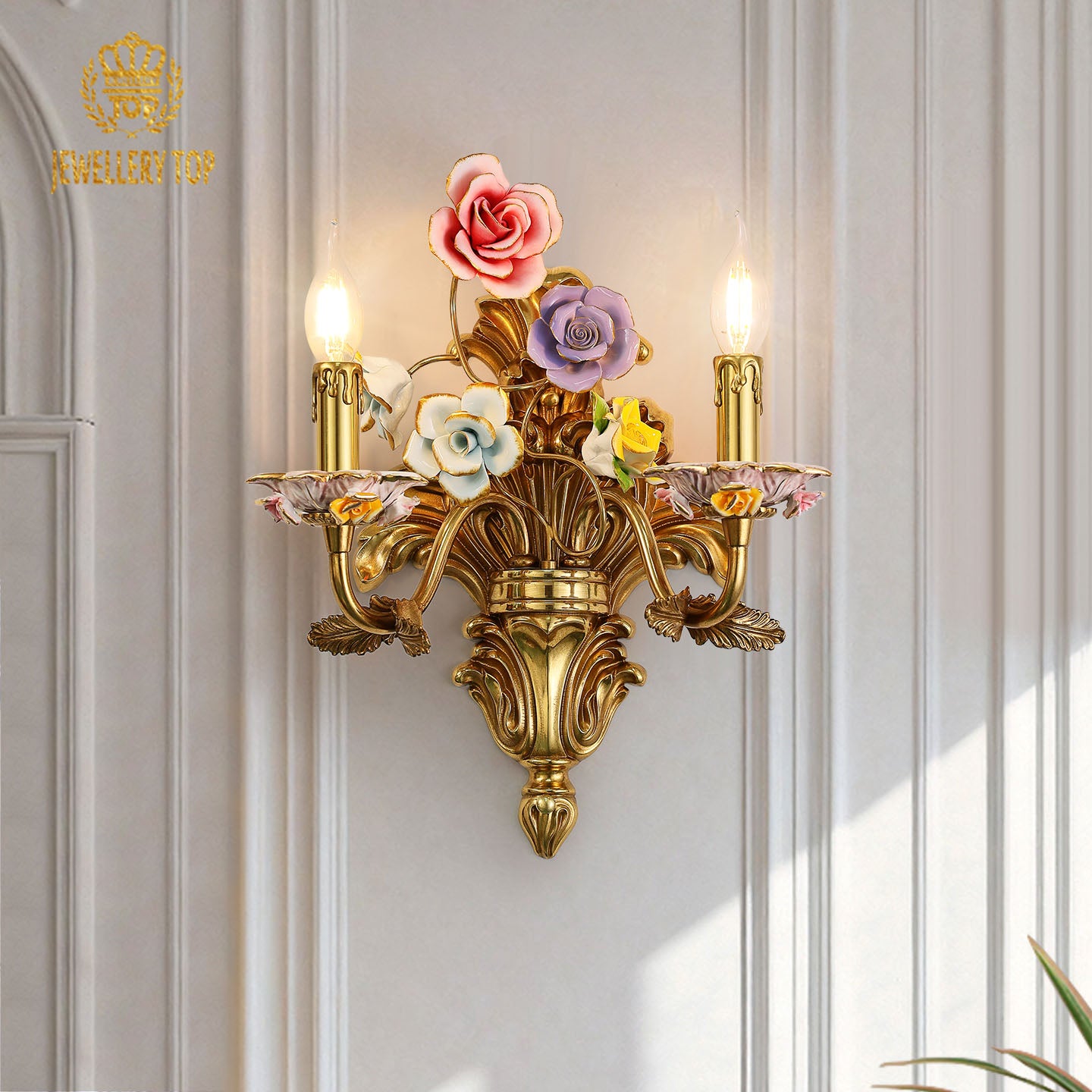 Front close-up of the French art decorative wall sconce showcasing pink, purple, and yellow hand-painted ceramic blossoms.