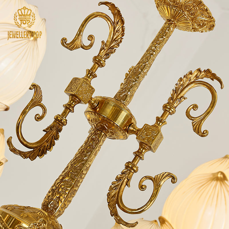 Angled perspective highlighting the symmetrical arrangement of eight lights and the elaborate sculpted column.
