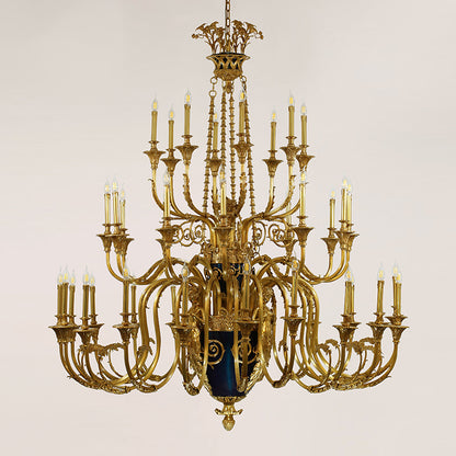 A multi-tiered, ornate large brass chandelier with intricate metalwork, brand JEWELLERY TOP.