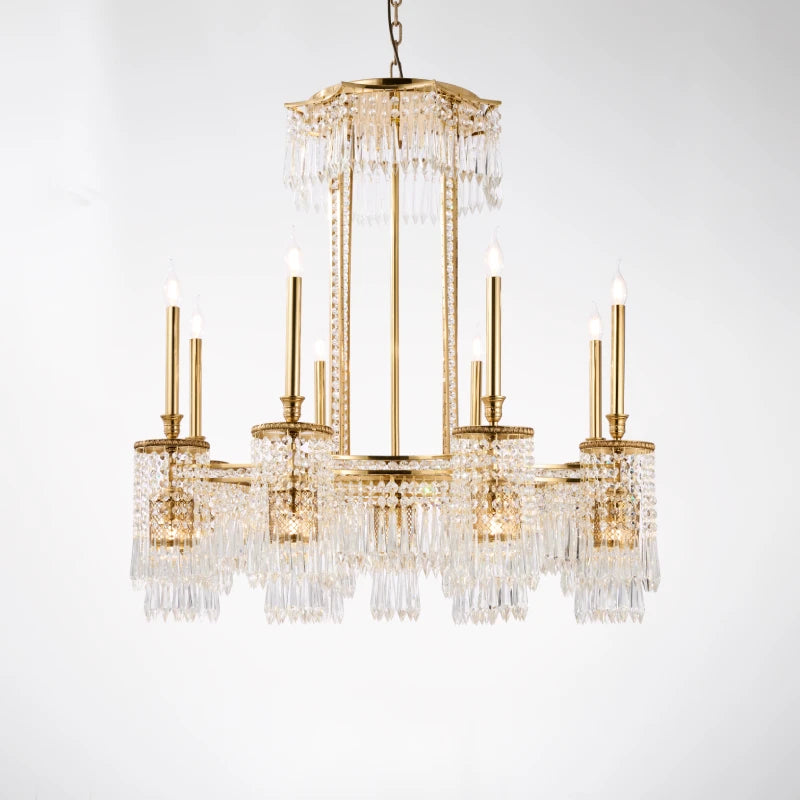 Multi-tiered European brass chandelier with crystal fringe, suspended by chains, black background.