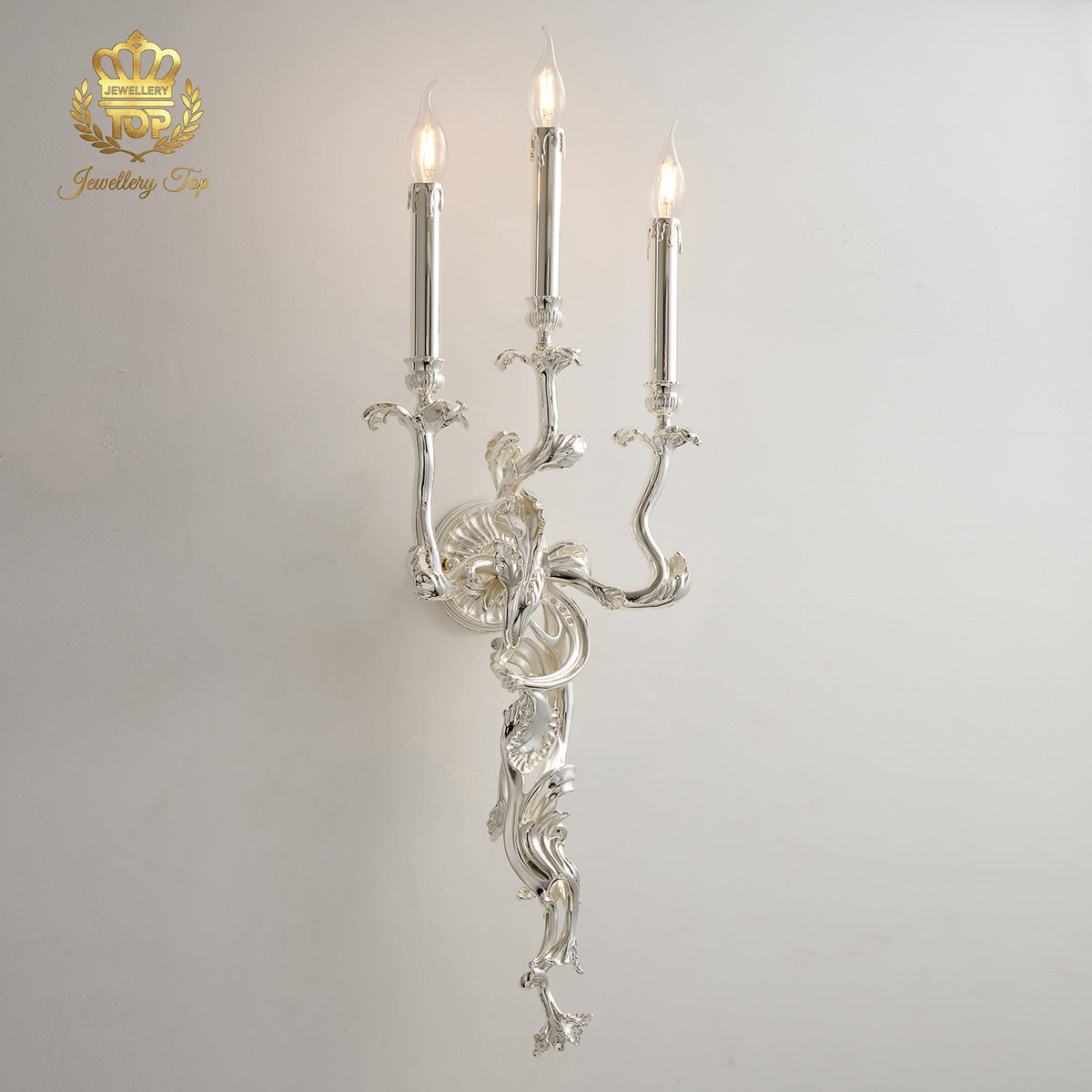 Front view of The Chloris Rococo 3-light wall sconce featuring a luxury silver chrome finish by Jewellery Top.