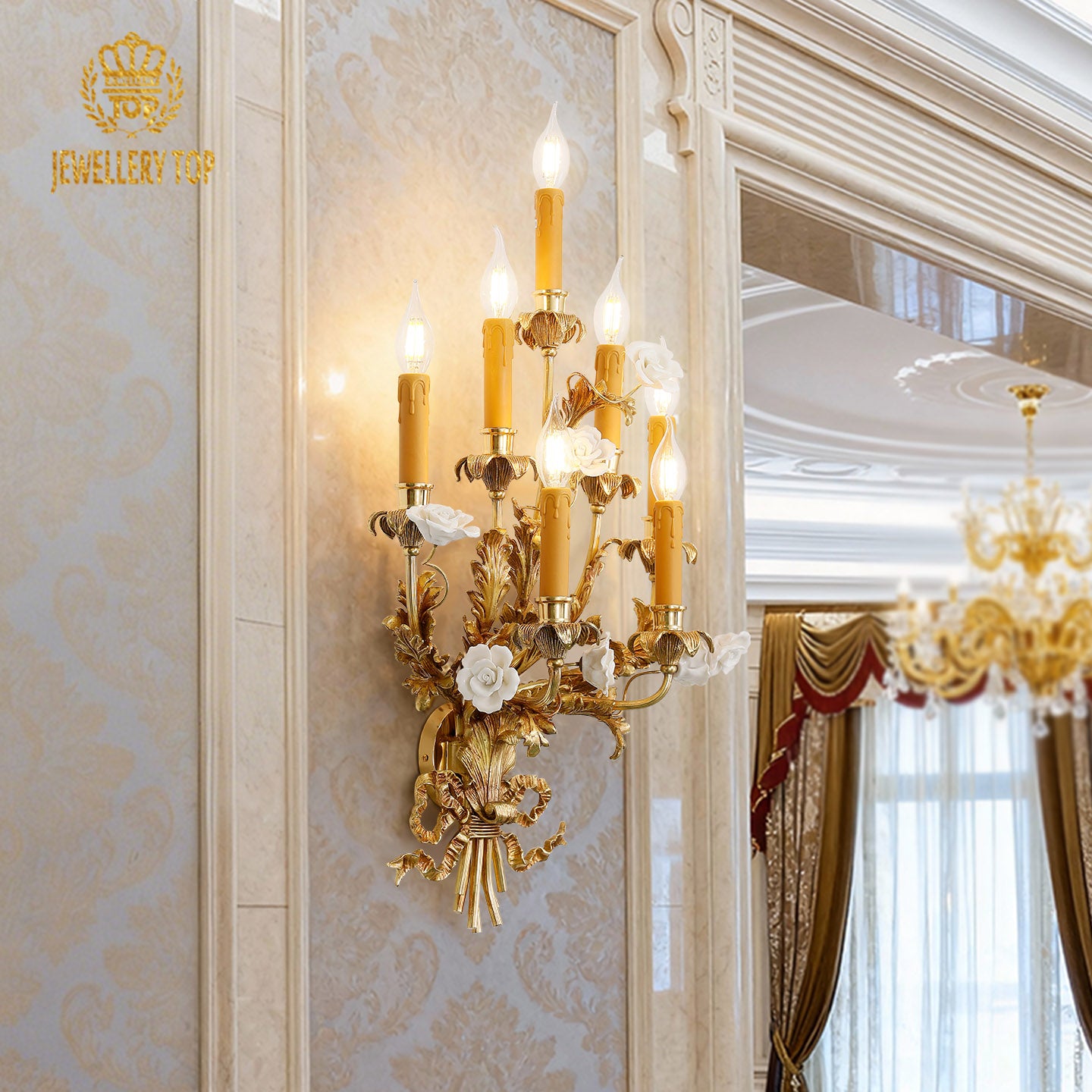 Extreme macro close-up of the sconce’s intricate central brass scrollwork, leaf details, and a single white ceramic rose.