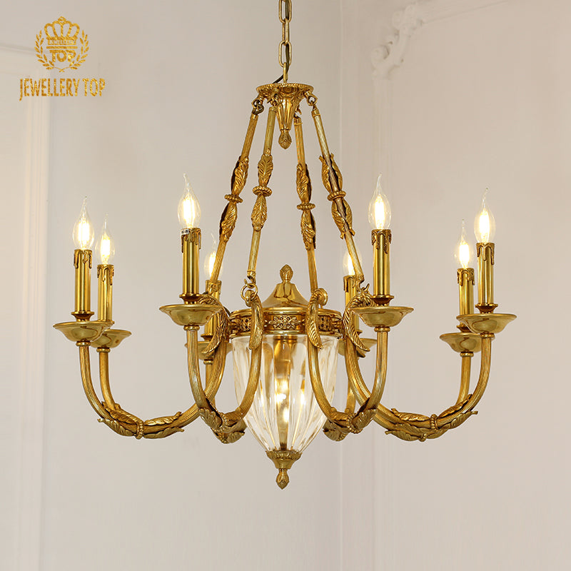 Macro close-up of the finely detailed golden acanthus leaf embellishments and the precision-cut crystal pendants.