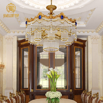 Angled perspective showcasing the tiered layers of cascading K9 crystal strands and the elegant cylindrical glass shades.