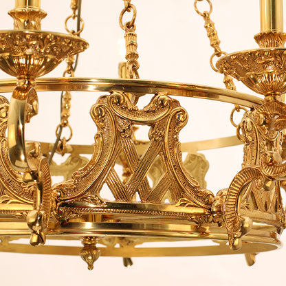 Extreme detail shot focusing on the teardrop crystal pendants and the finely cast golden acanthus leaves.