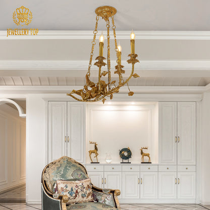 JEWELLERY TOP brand's antique chandelier featuring a detailed golden cherub sculpture and leafy tendrils.