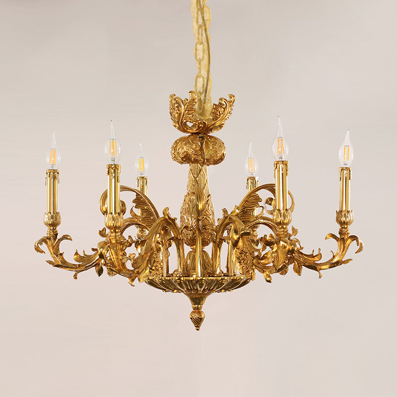 Macro close-up of the finely sculpted golden acanthus leaves and the ornate candle drip tips.