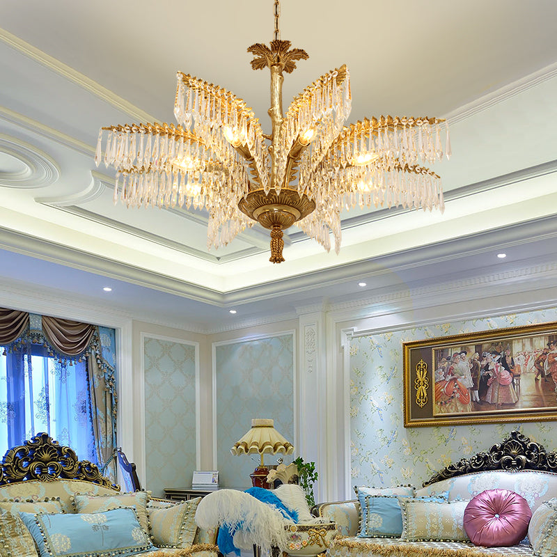 Interior scene featuring a classical crystal brass chandelier above a luxurious living room.