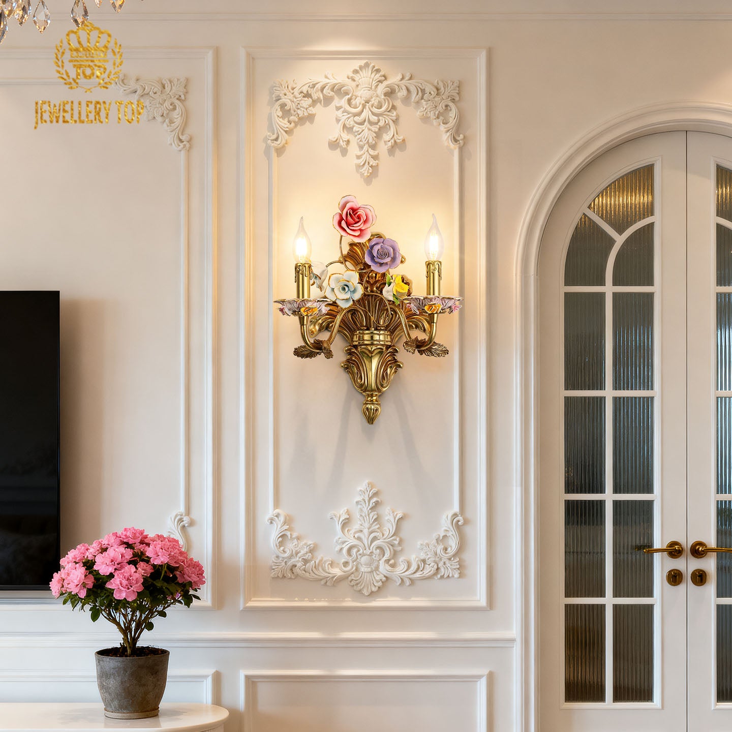 The installed ceramic flowers wall light in an elegant interior with a white cabinet, pink peonies, and decorative moldings.