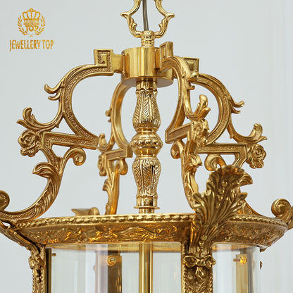 Detailed top view of the vintage brass pendant light’s ornate canopy and chain from JEWELLERY TOP.