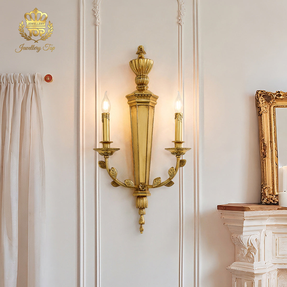 Lifestyle image of the George III Girandole sconce beside an ornate fireplace mantle by Jewellery Top.