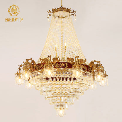 JEWELLERY TOP branded golden brass chandelier with bird sculptures and crystal cascade.