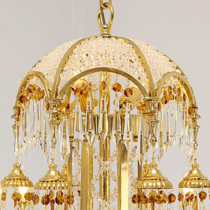 Macro close-up of the finely detailed golden foliage and the precision-cut crystal prisms on the canopy.