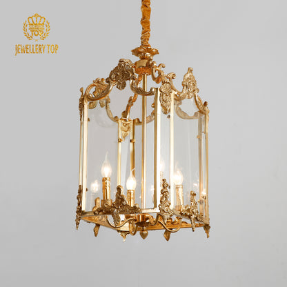 Front view of JEWELLERY TOP’s brass lantern pendant light with clear glass panels.