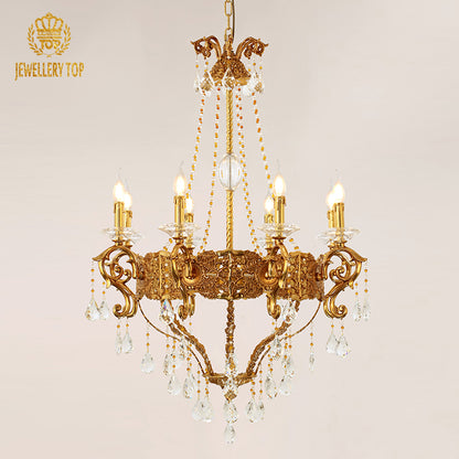 Angled perspective highlighting the symmetrical arrangement of candle-style lights and the intricate brass framework.