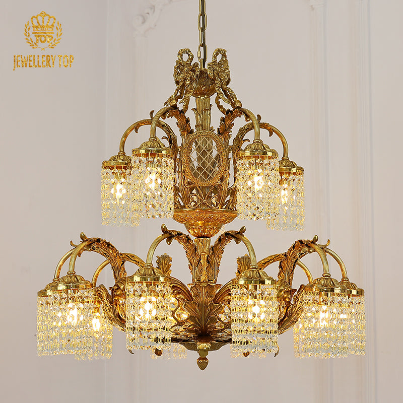 A luxurious interior view featuring the large eagle-motif brass chandelier illuminating a grand space with ornate ceiling moldings.