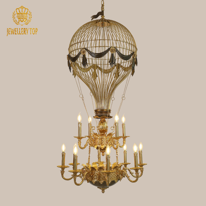 JEWELLERY TOP brand's hot-air balloon brass decorative chandelier on a beige background.